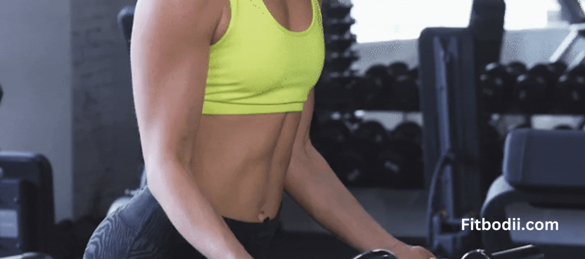 Athletic_Woman_Doing_Biceps_Curls_at_the_Gym